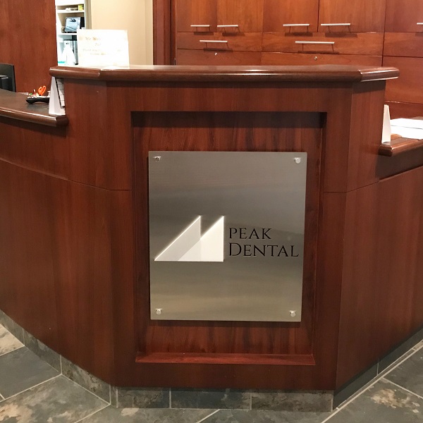 Metal Plate Sign at Reception